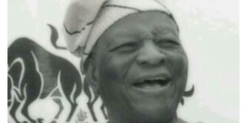 Man Laughing Wearing A Cap